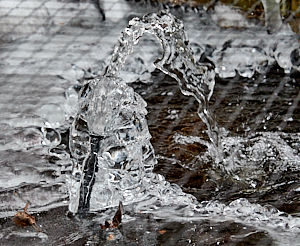 Ice build up around water spout