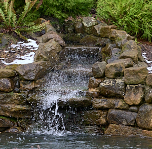 Water being blown back up waterfall