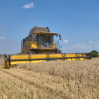 Combine harvester working
